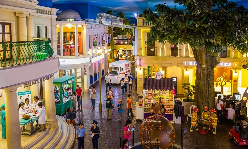 KidZania Dubai indoor theme park with children participating in role play activities mini city experience